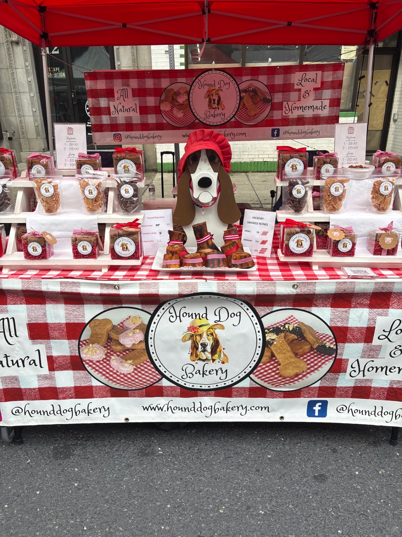 Hound Dog Bakery market booth with treats display