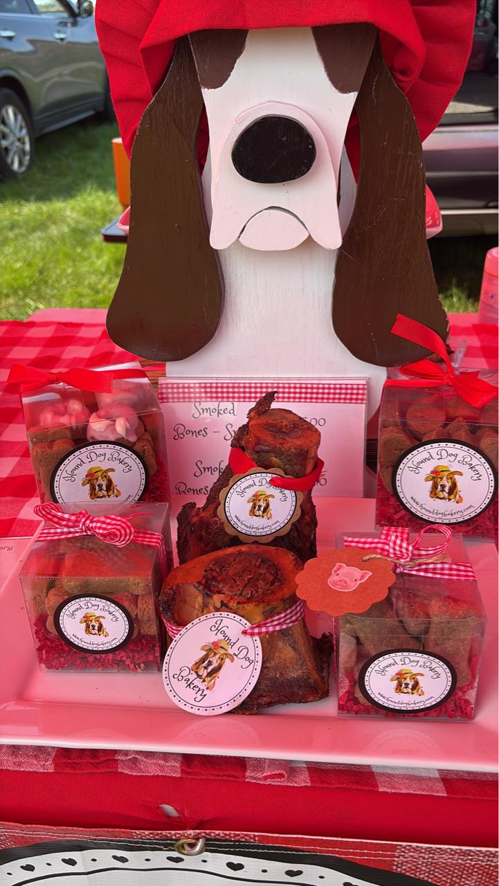 Hound Dog Bakery booth with smoked bones and treat boxes